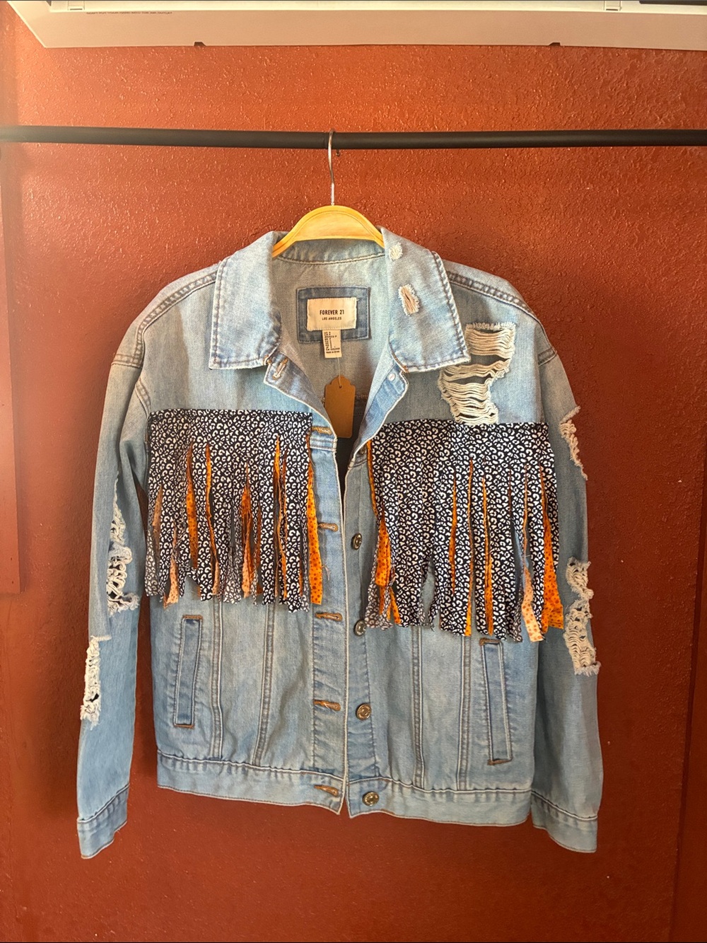 Distressed Light Blue Def Leopard Denim Jacket with Fringe Accents